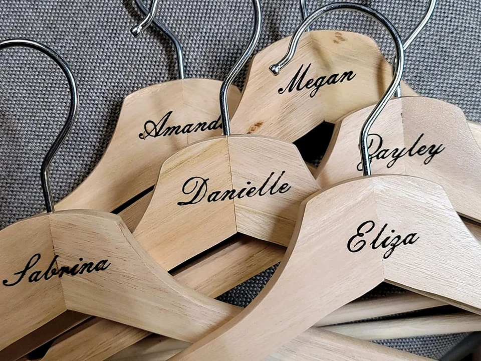 Wooden clothes hangers personalized with engraved names